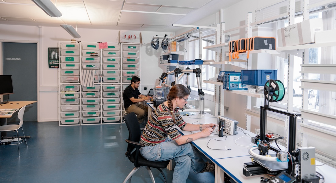Two researchers in the department's fabrication lab